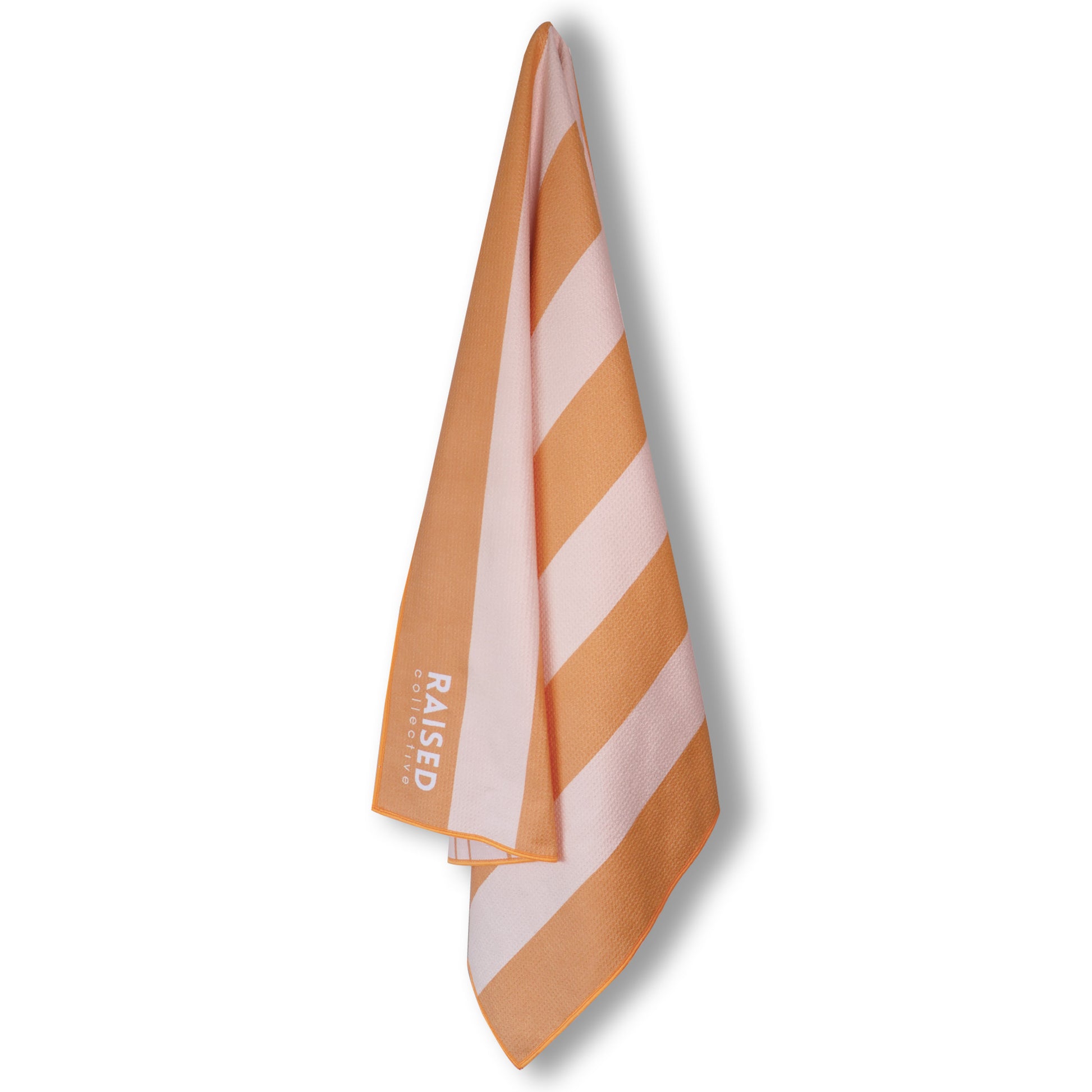 Amalfi sand free beach towel made from recycled materials, double sided design in an orange and pearl beige stripe.