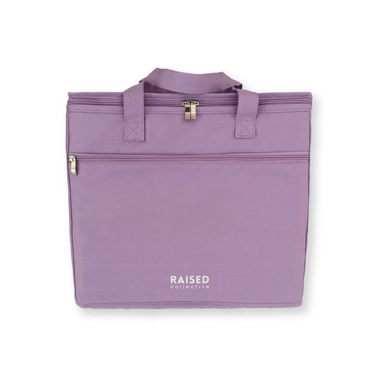 Picnic cooler bag in lilac, large main insulated compartment and smaller front zippered compartment for keys, wallet and phone.  For beach and picnic days, buy well and buy once.