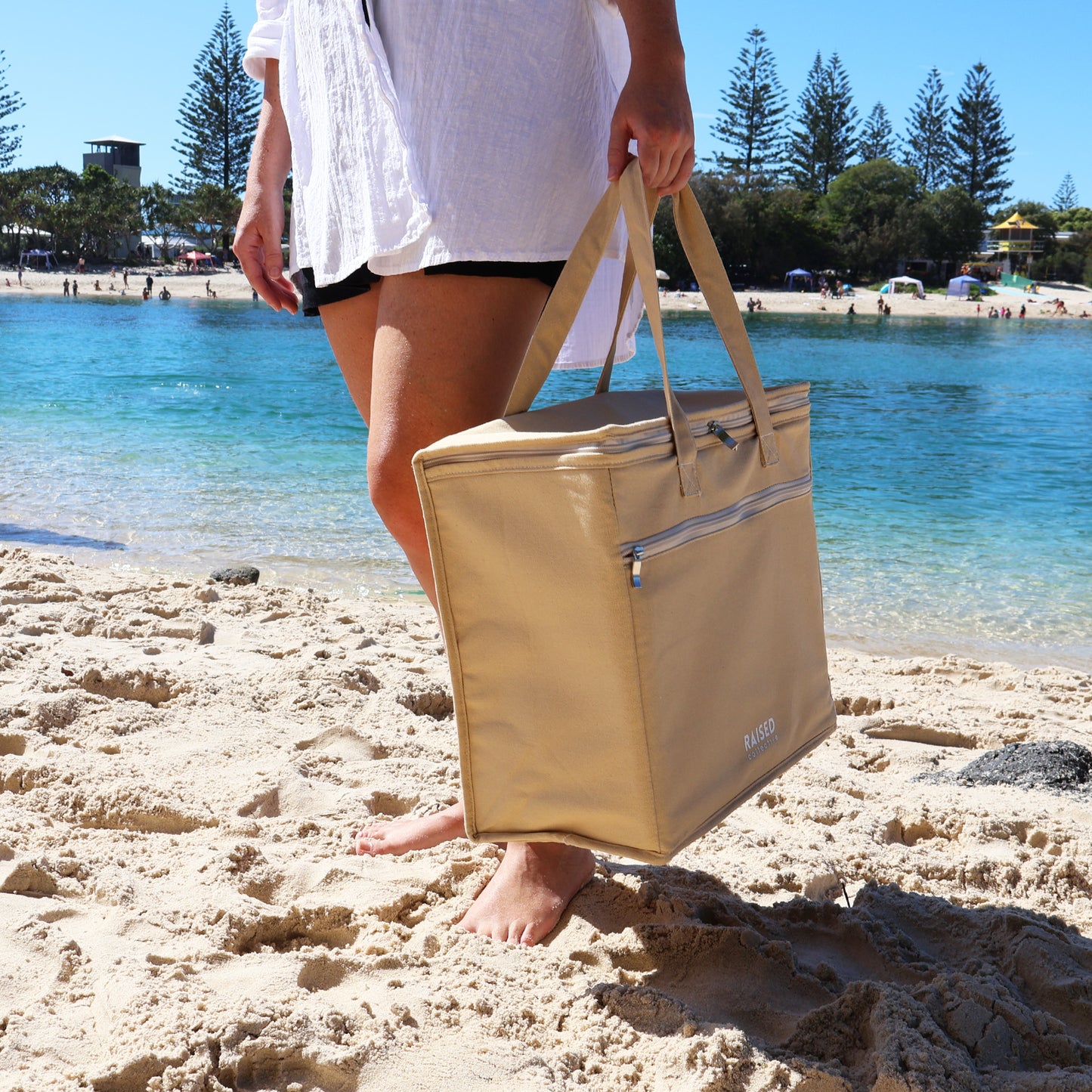 Picnic cooler in sand pictured at Tallebudgera Creek.  Perfect for those beach days to hold all your gear.